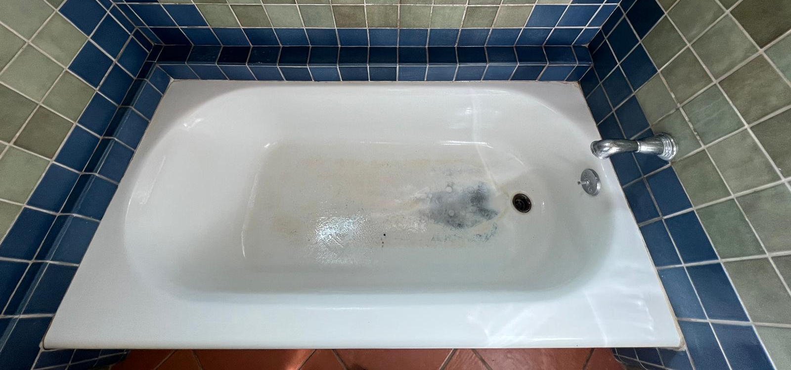 Before reglazing - worn bathtub