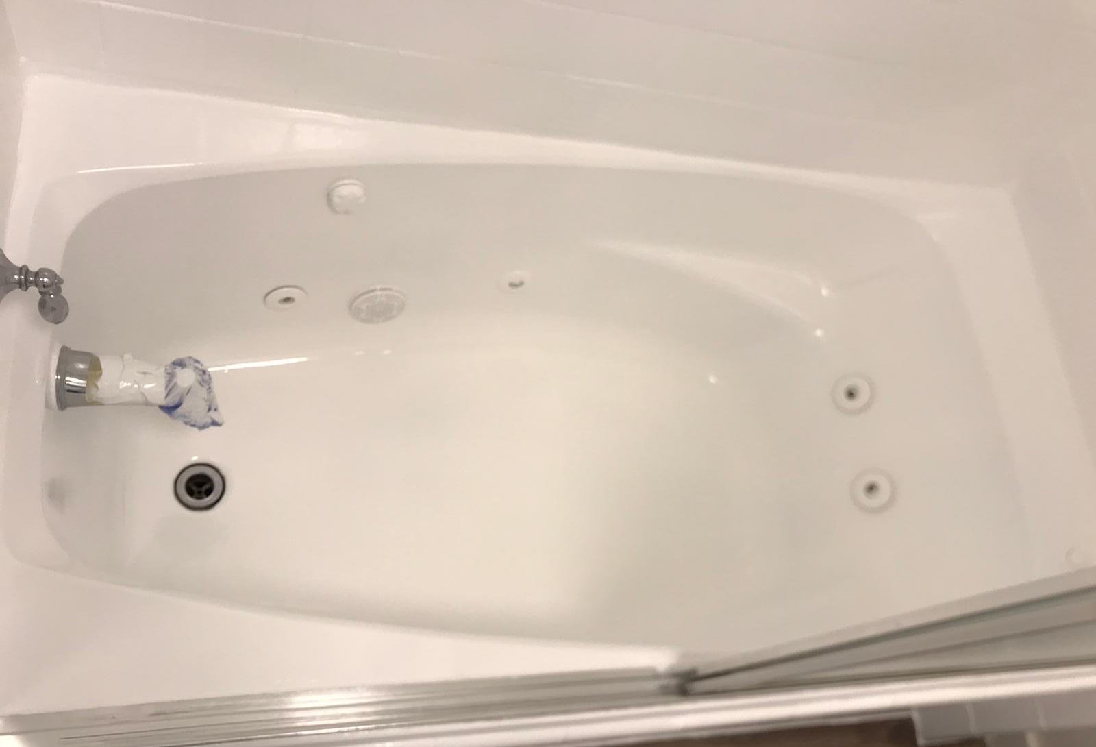 Jacuzzi tub after professional reglazing