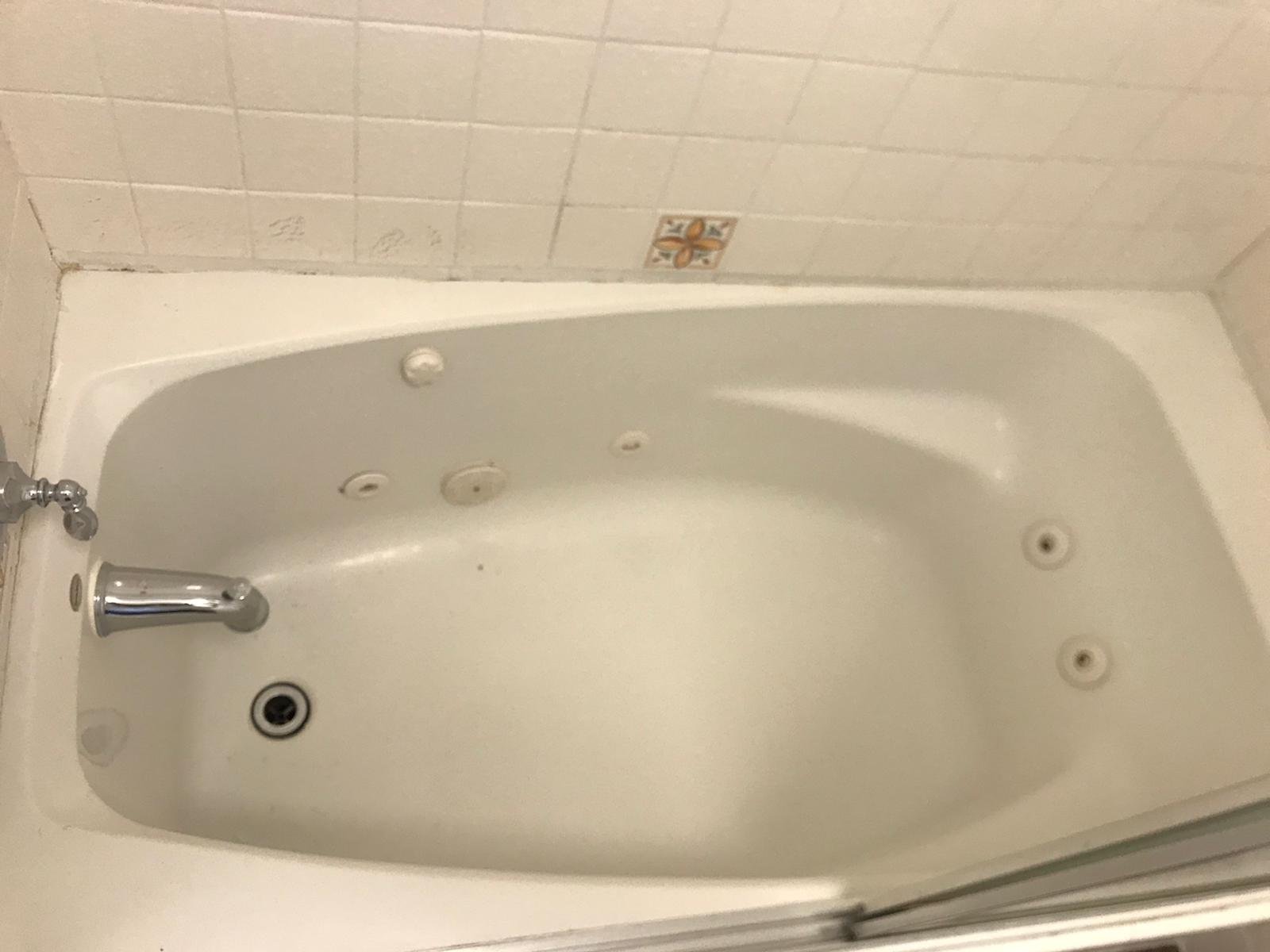 Jacuzzi tub before reglazing