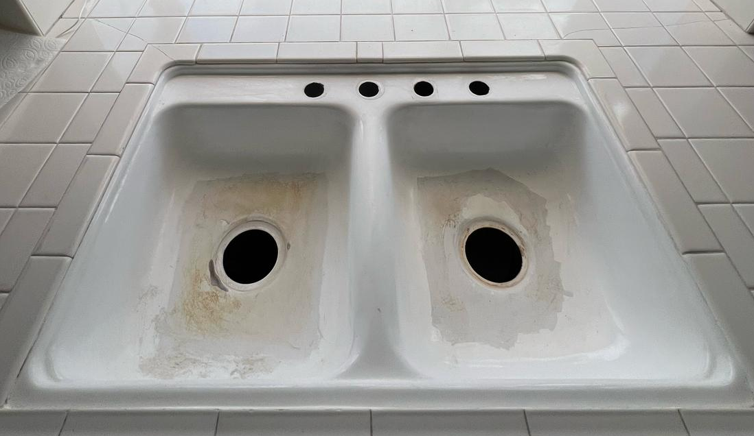 Bathroom vanity sink before reglazing