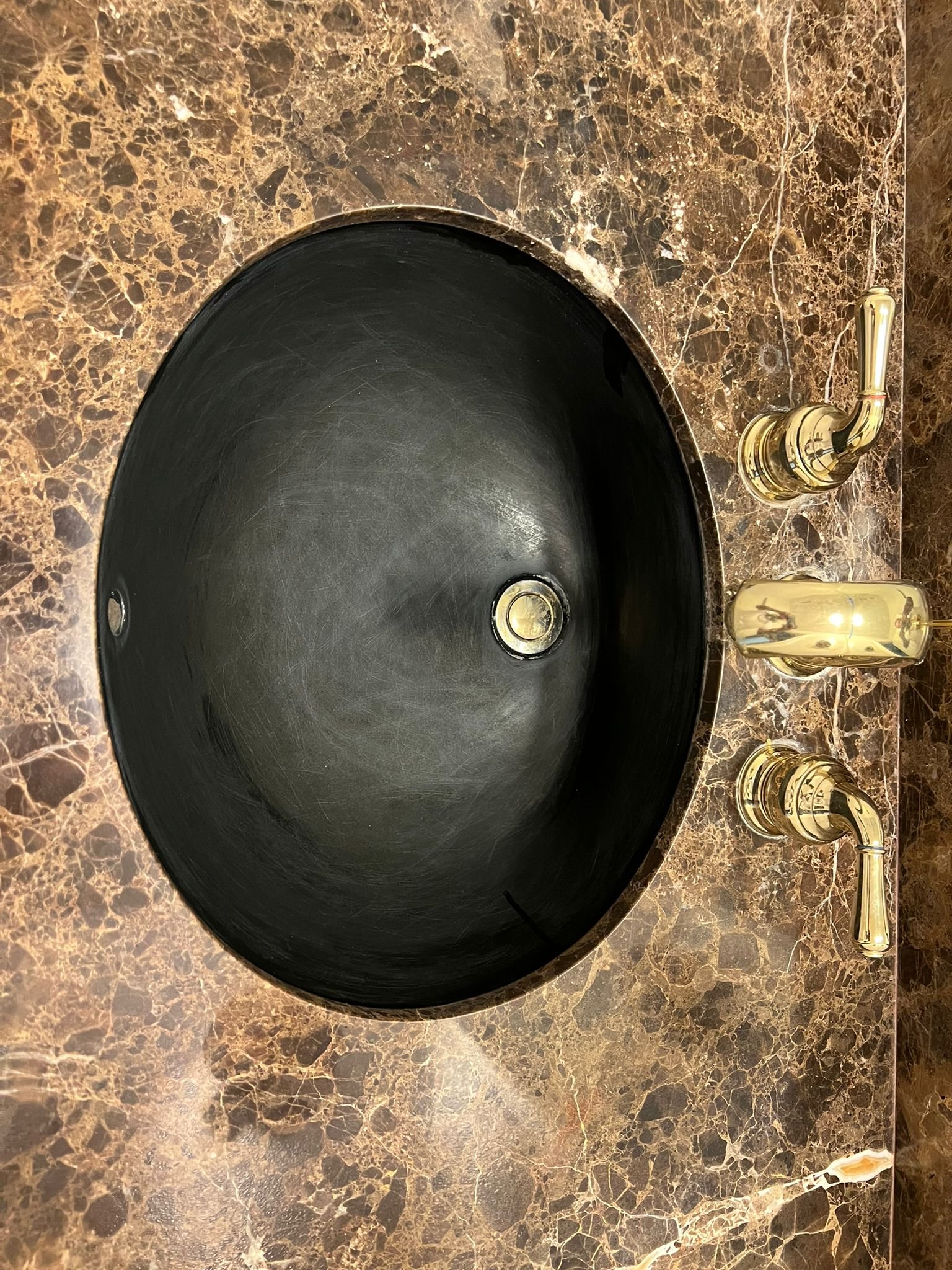 Before reglazing - scratched countertop